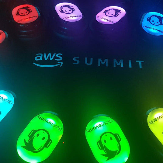 Quiet Events Silent Disco headphones for conferences a group of headphones with color LEDs in a circle