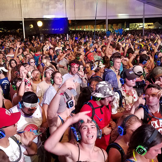 Quiet Events Silent Disco headphones for fairs a group of people with headphones