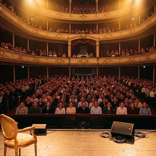 Every theater seat hearing crystal-clear audio through wireless headphones