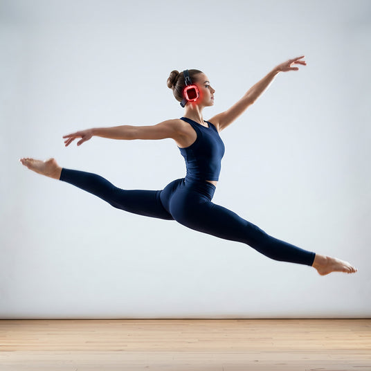 Dancer mid-jump wearing behind-the-head fitness silent disco headphones that stay in place